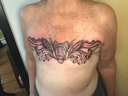 Black and Gray Ornamentation Mastectomy Tattoo on Unreconstructed Chest
